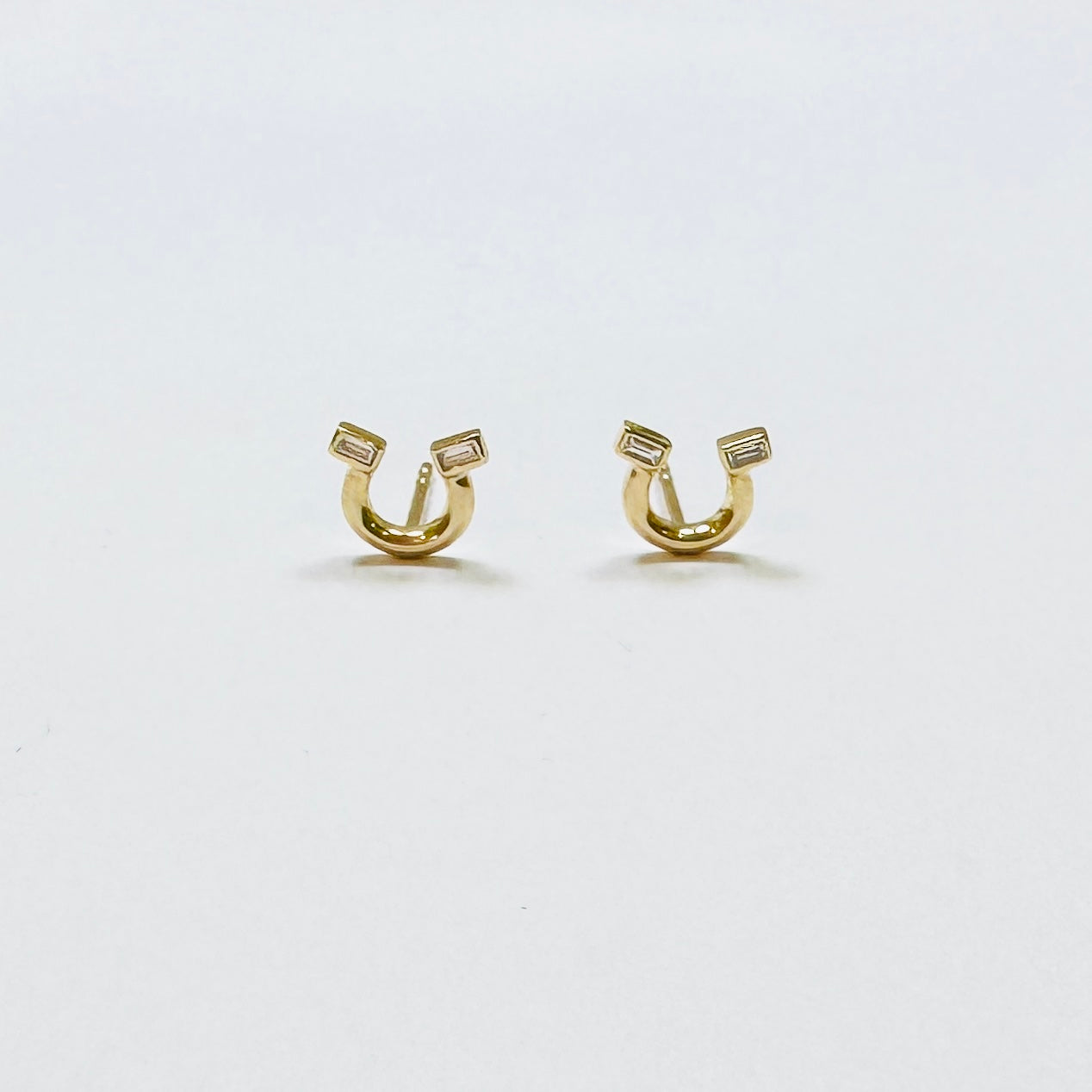 baguette horseshoe studs