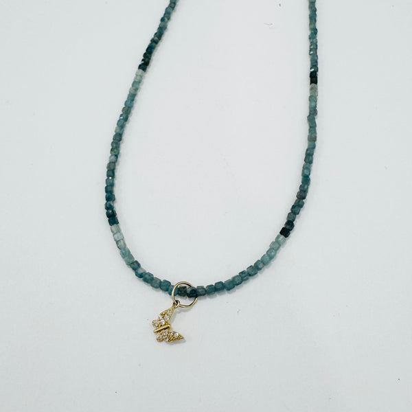 delicate gemstone necklace with diamond butterfly charm