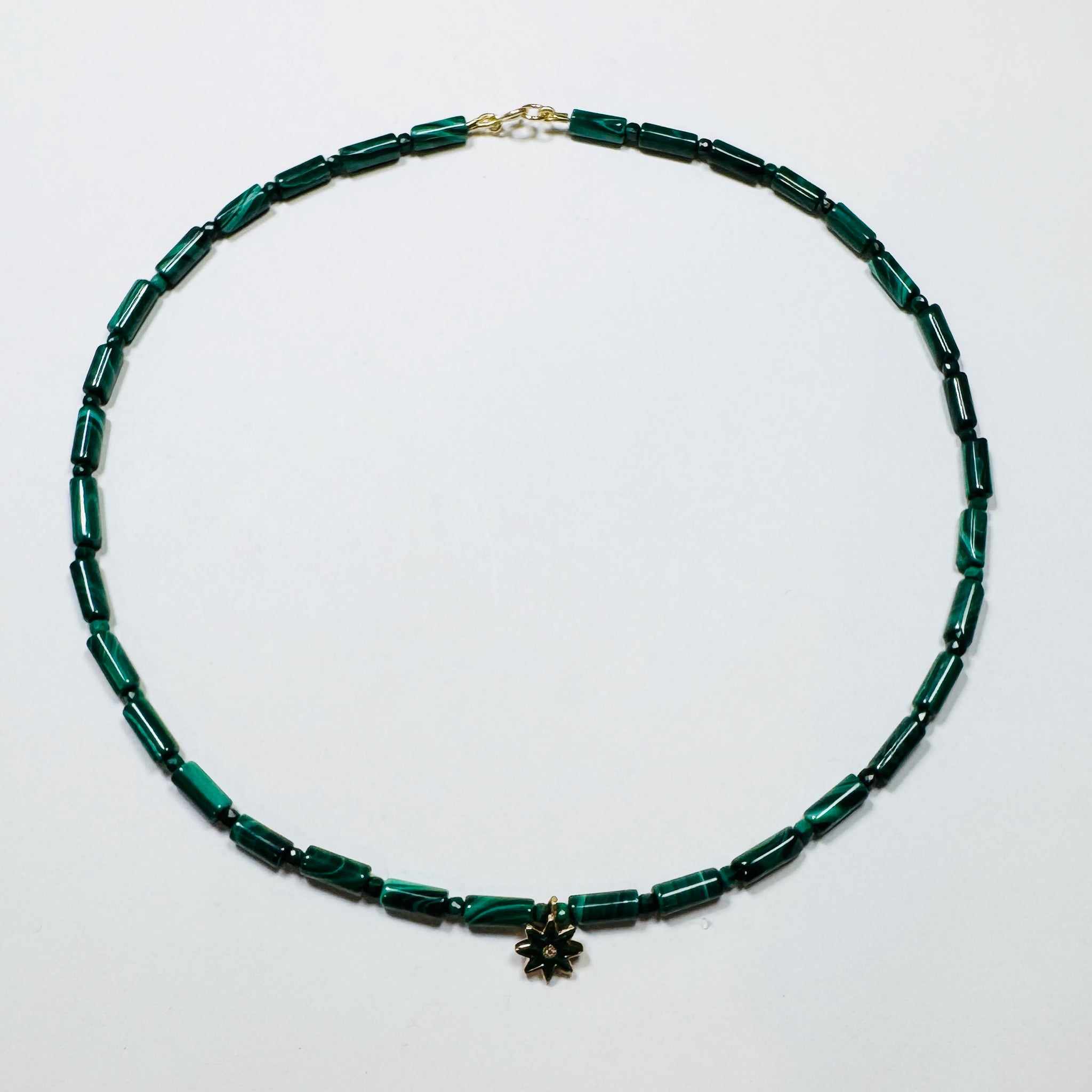 tube malachite necklace with starburst charm