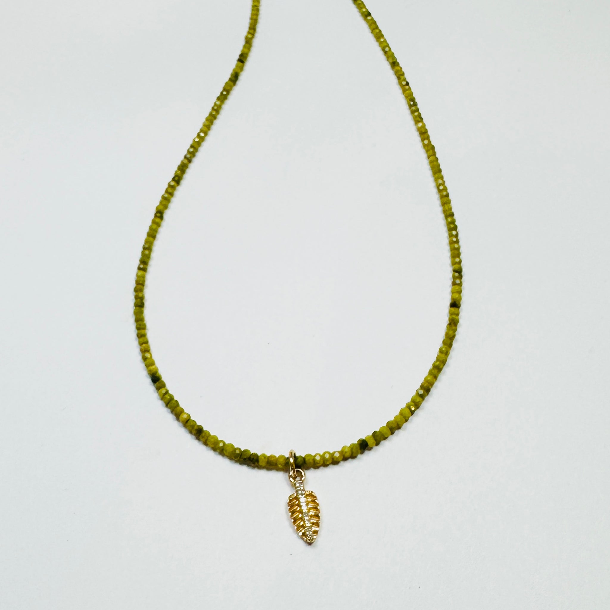 delicate green turquoise necklace with leaf charm