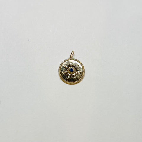 sand-dollar pendant, blue sapphire