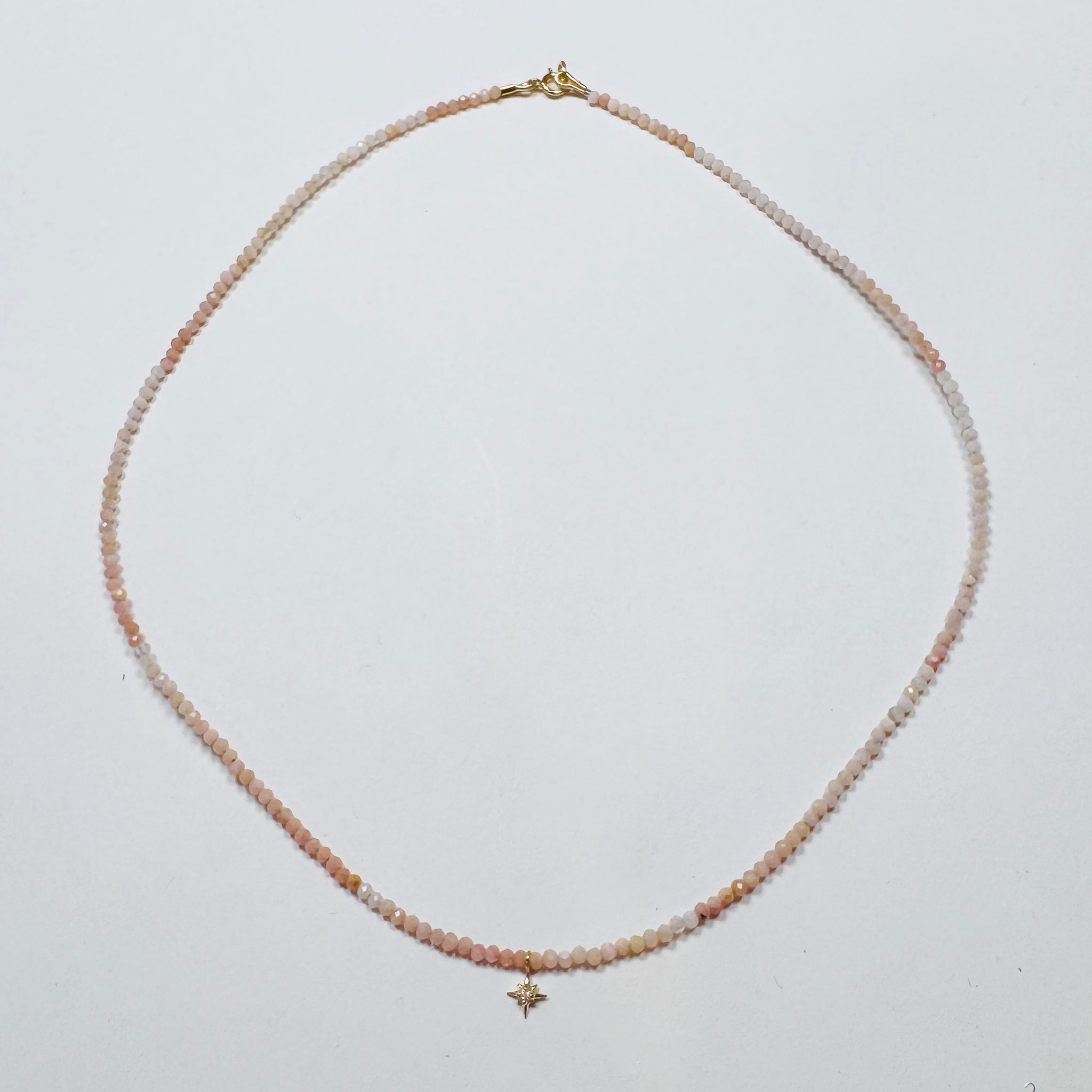 delicate turquoise necklace with diamond star charm