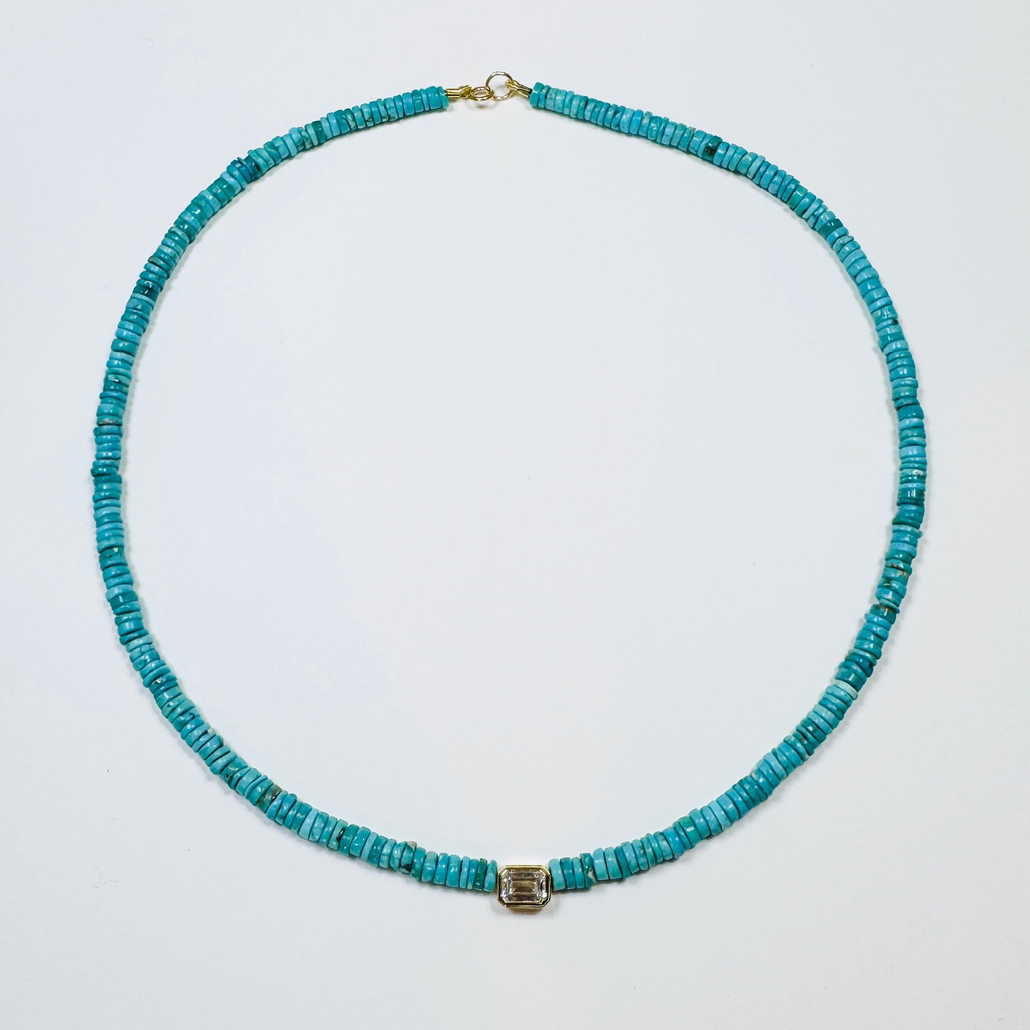 turquoise necklace with emerald cut bezel set diamond