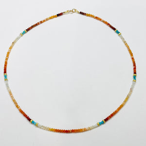 delicate shaded fire opal necklace with turquoise and gold nuggets