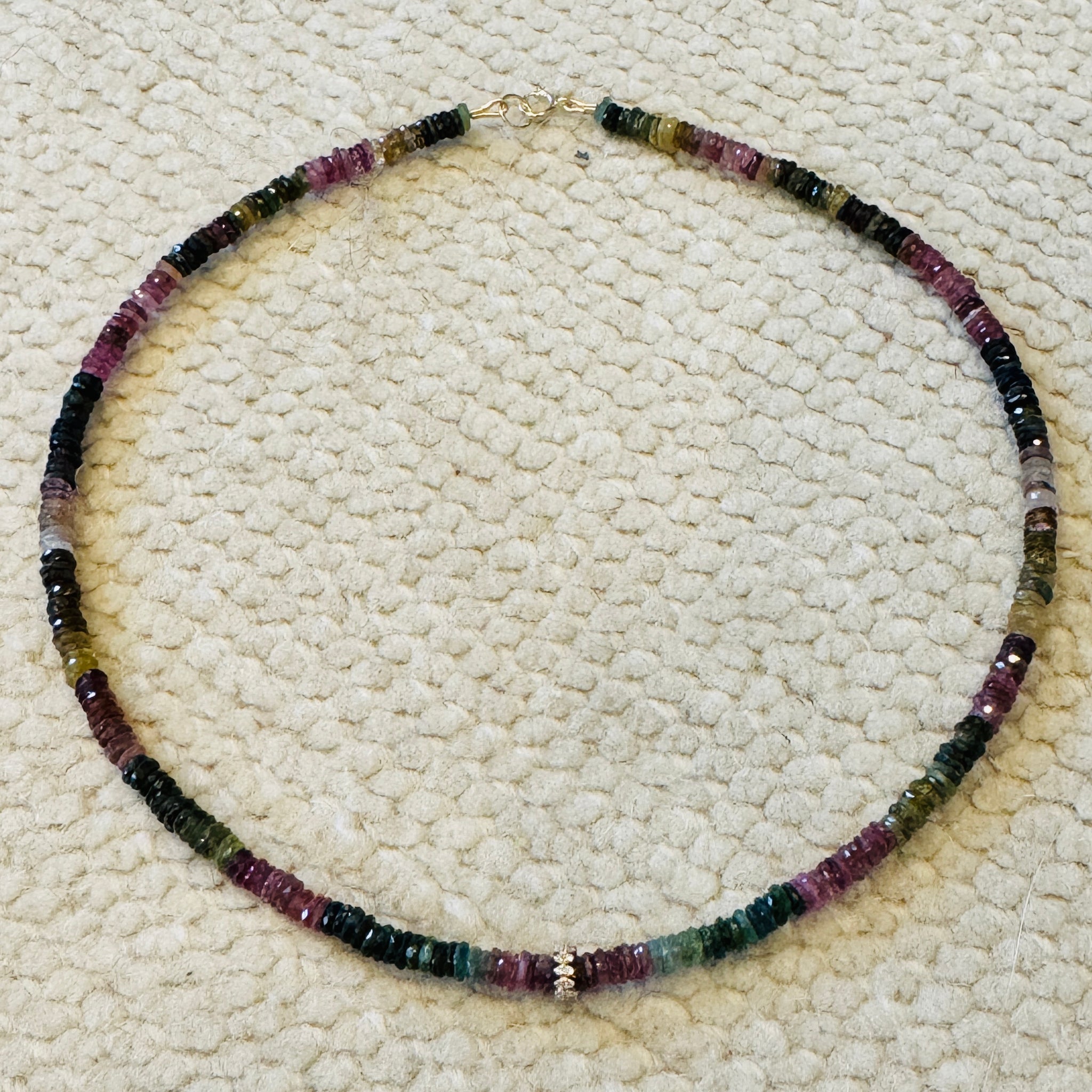 faceted tourmaline with diamond barrel