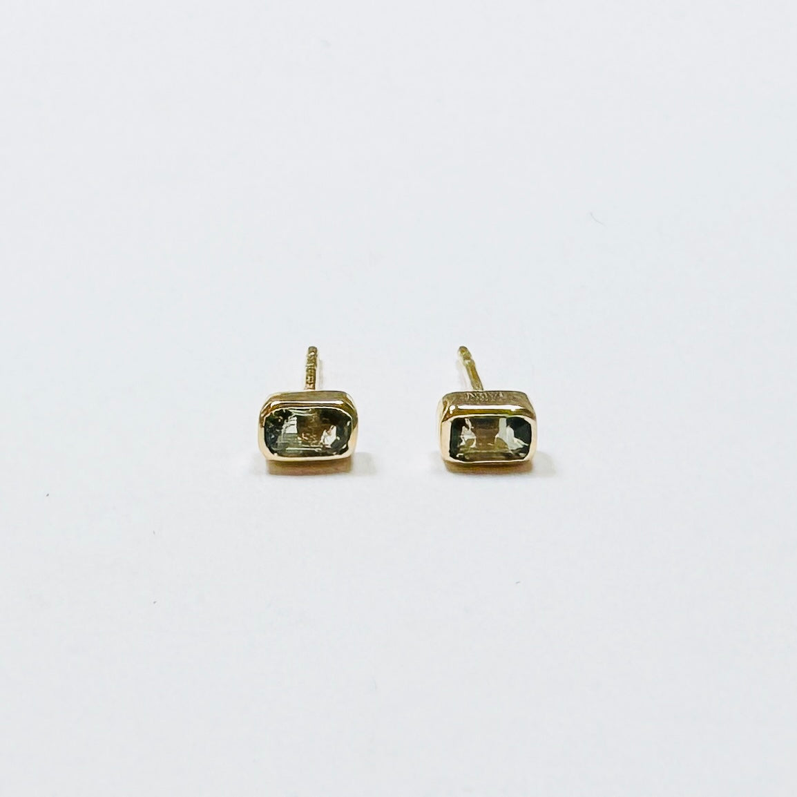 green sapphire bezel set studs