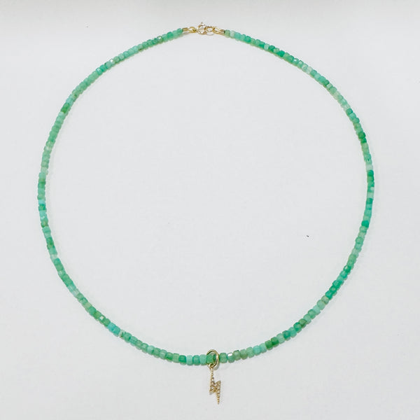 delicate gemstone necklace with lightning bolt charm