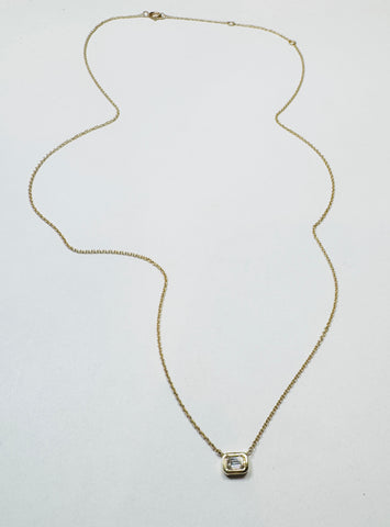 emerald cut diamond on gold chain