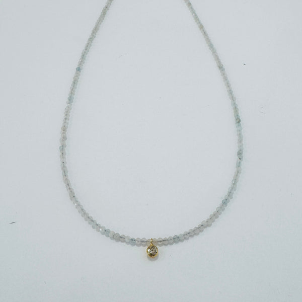 delicate necklace with bezel set diamond