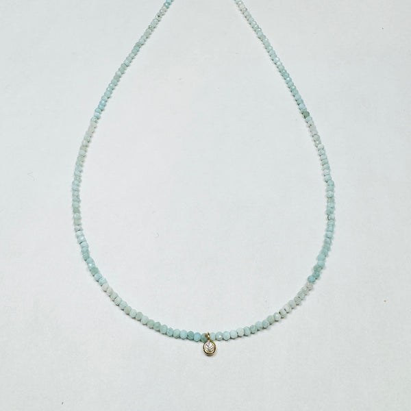 delicate necklace with bezel set diamond