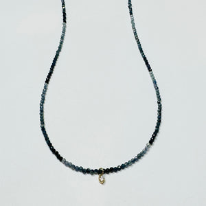 delicate necklace with prong set diamond