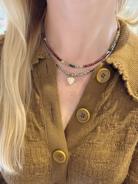 delicate block pyrite necklace with doily heart charm