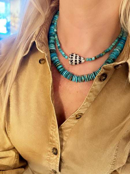 Shell, turquoise, and gold beads
