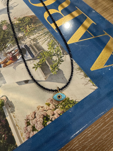 delicate lapis necklace with evil eye charm