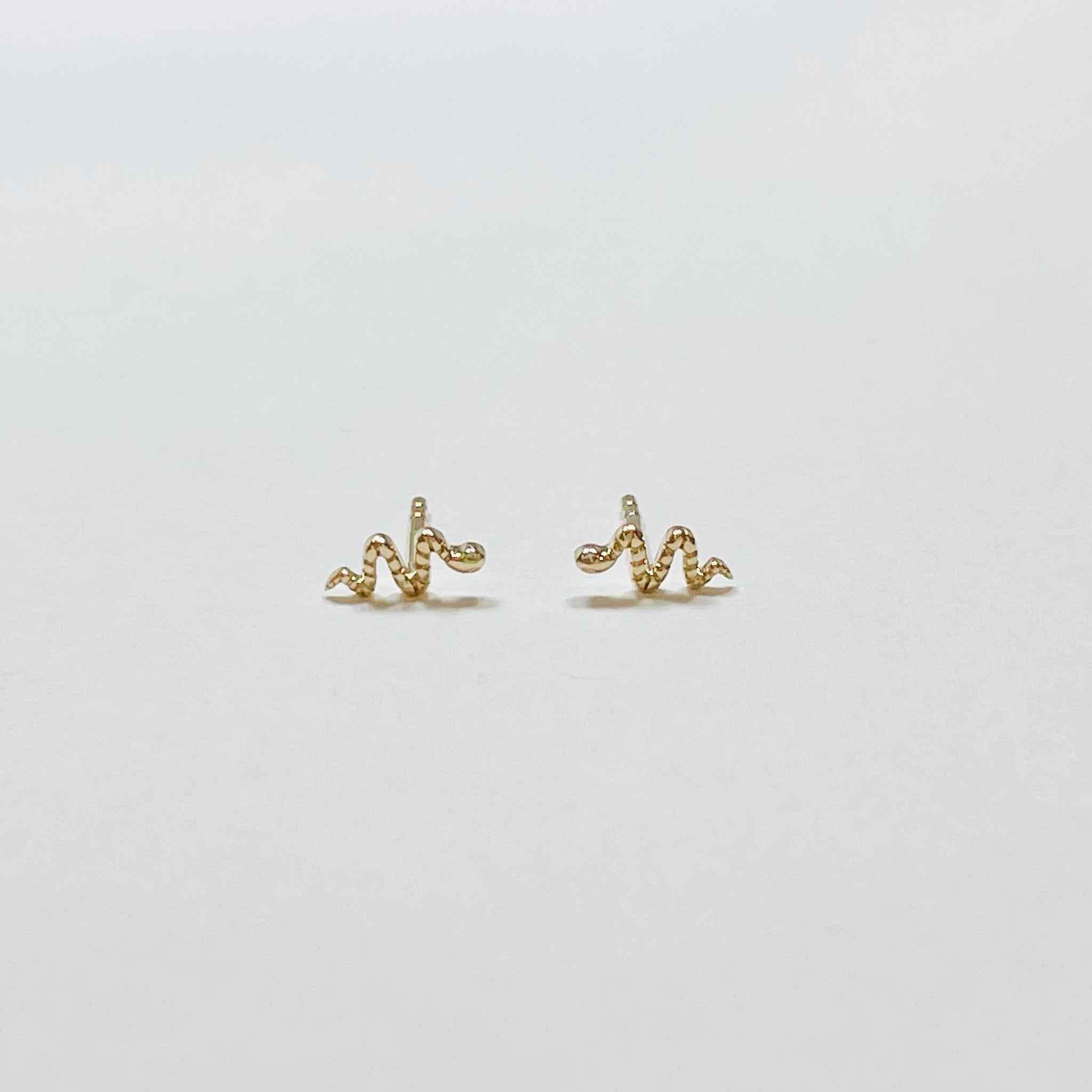 textured snake studs