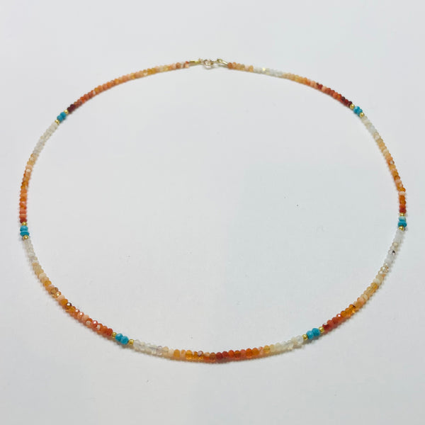delicate shaded fire opal necklace with turquoise and gold nuggets
