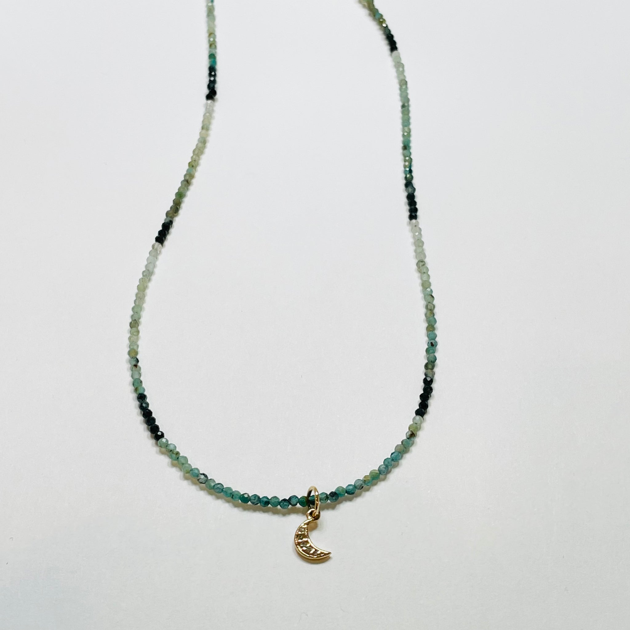 delicate tourmaline necklace with moon charm