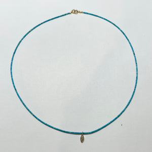 delicate turquoise necklace with charm