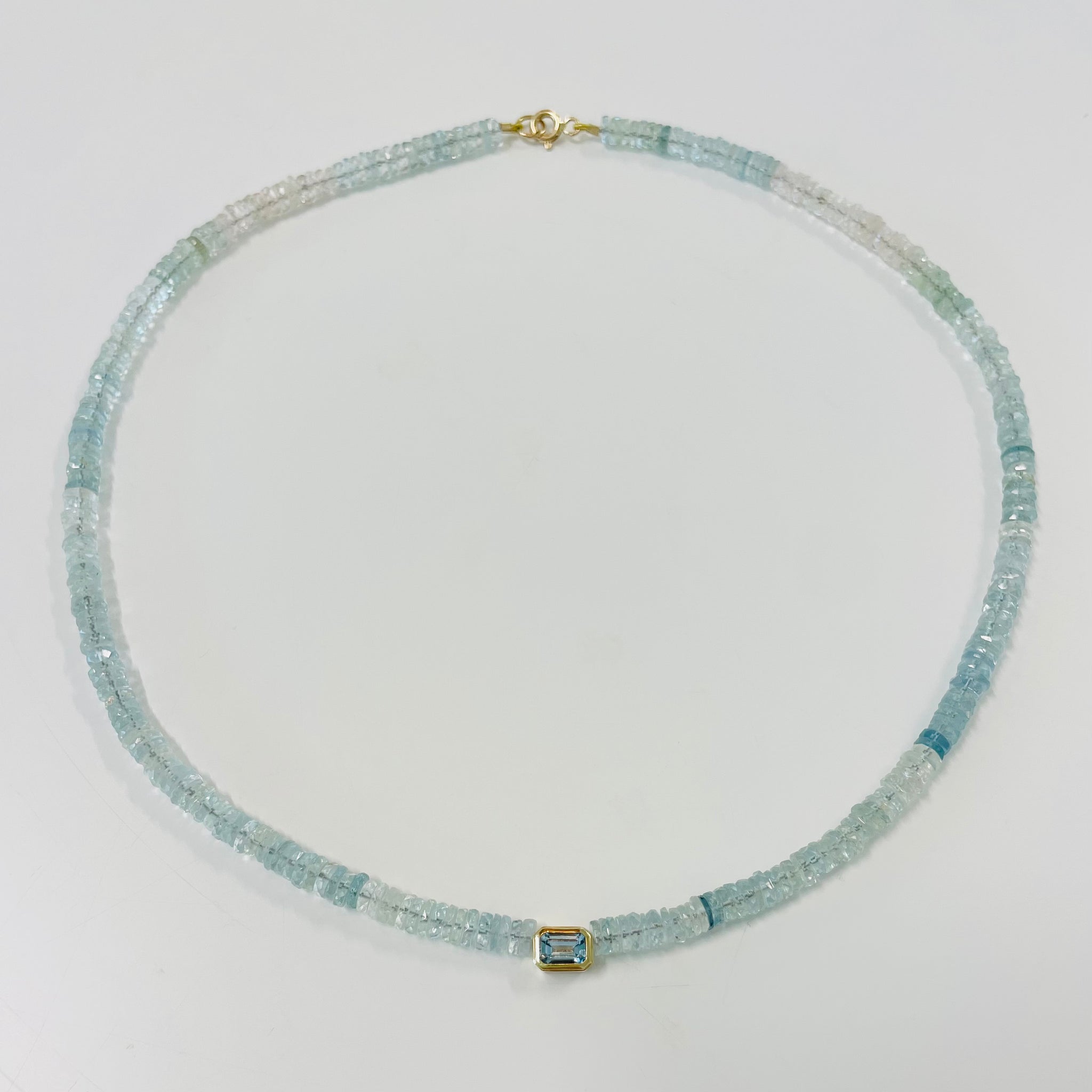 aquamarine heishi necklace with bezel set topaz