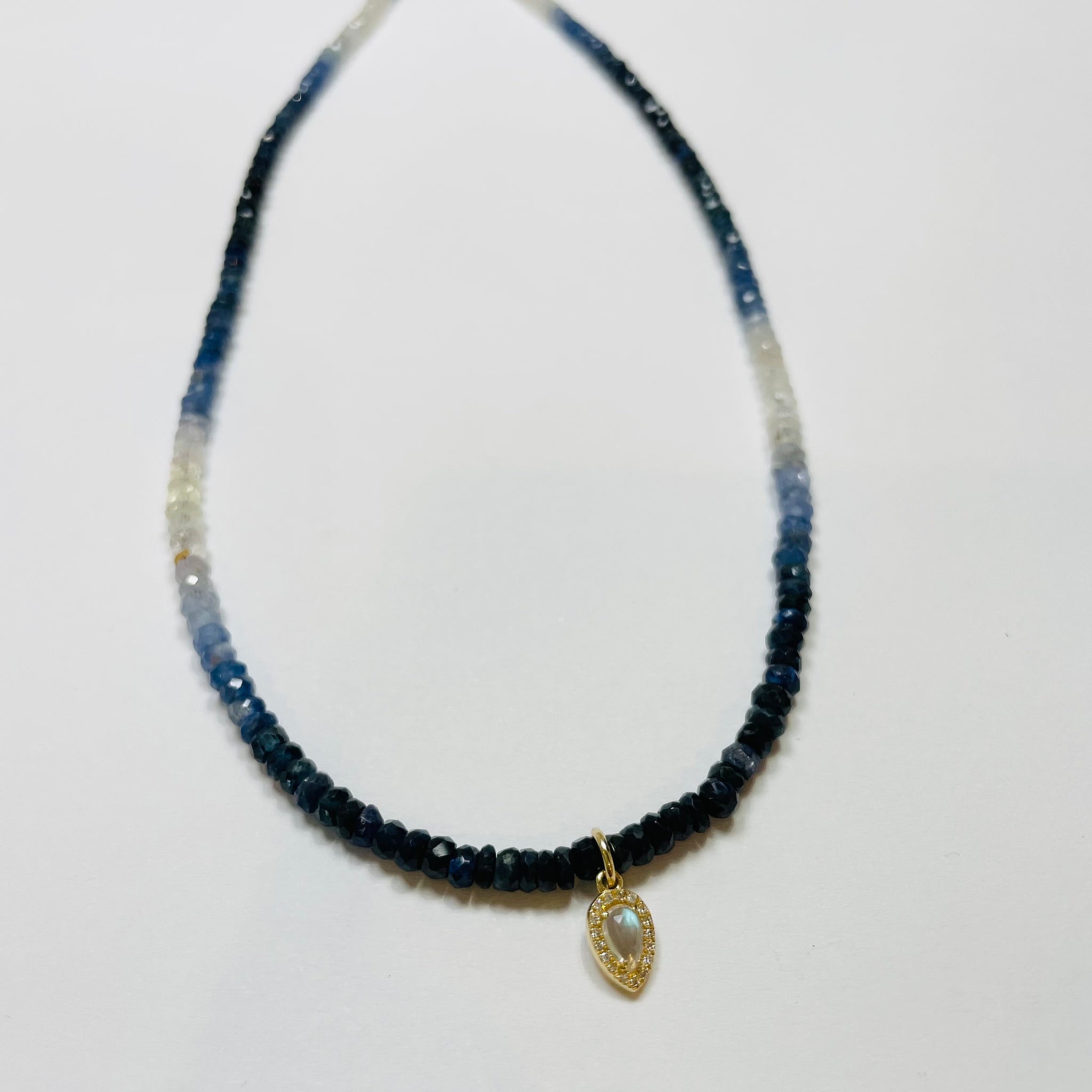 delicate shaded blue sapphire necklace with diamond moonstone charm