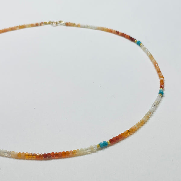 delicate shaded fire opal necklace with turquoise and gold nuggets