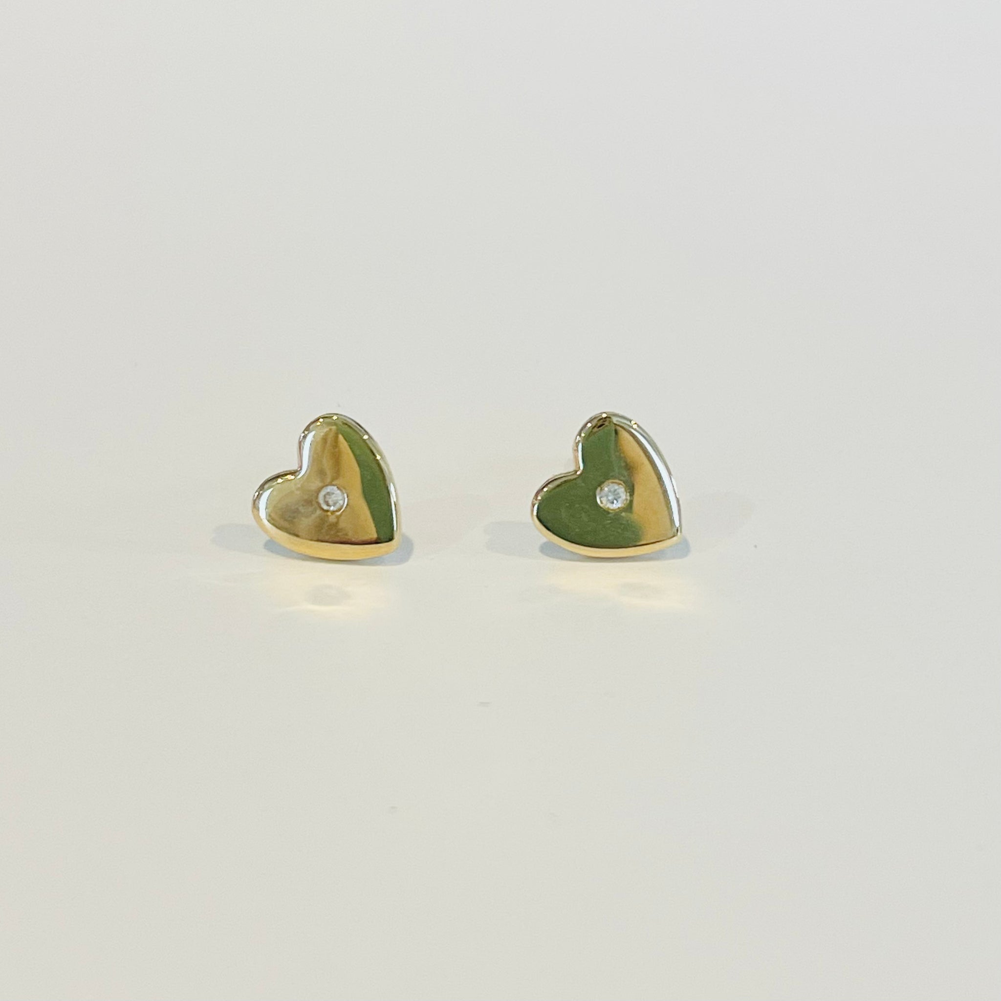 diamond center heart studs