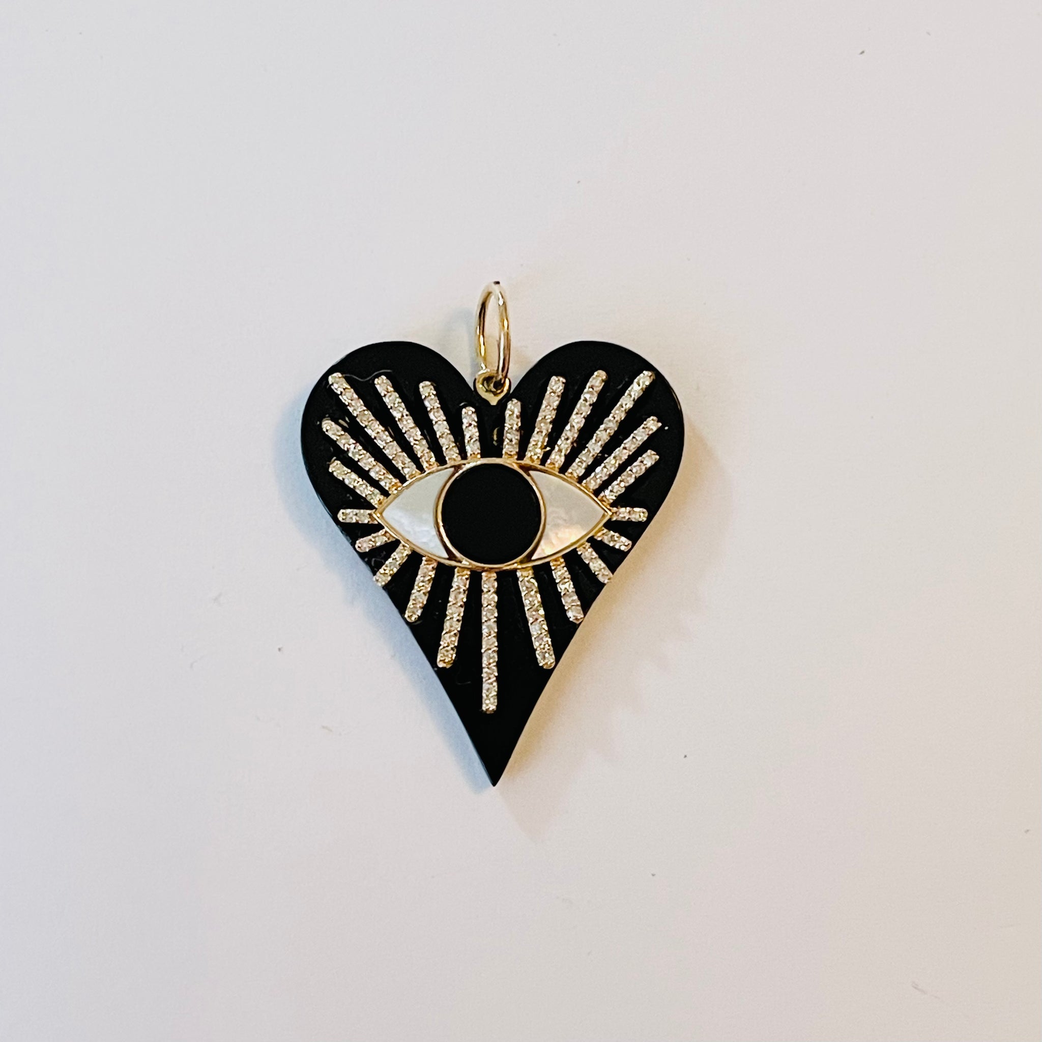 onyx heart pendant with lapis evil eye