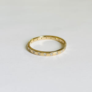 gold band with diamonds