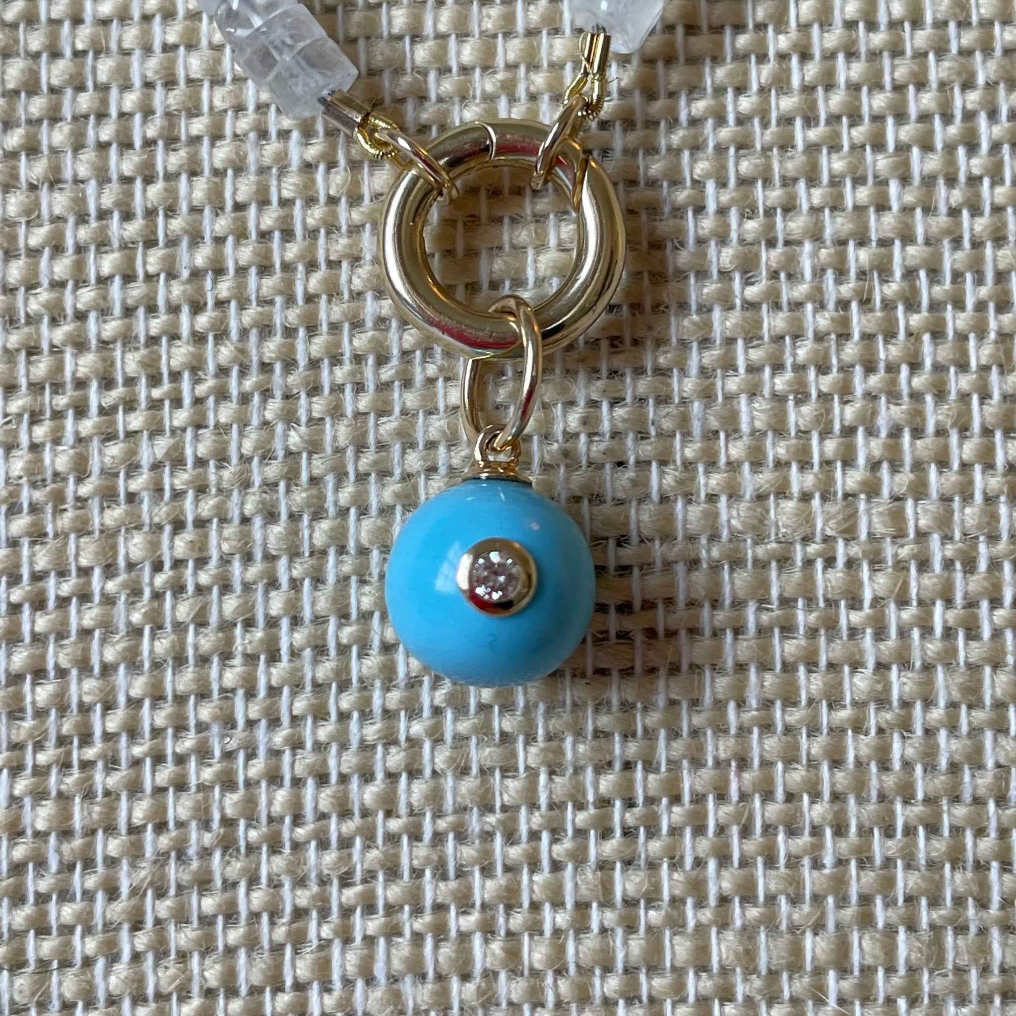 turquoise ball with diamond pendant