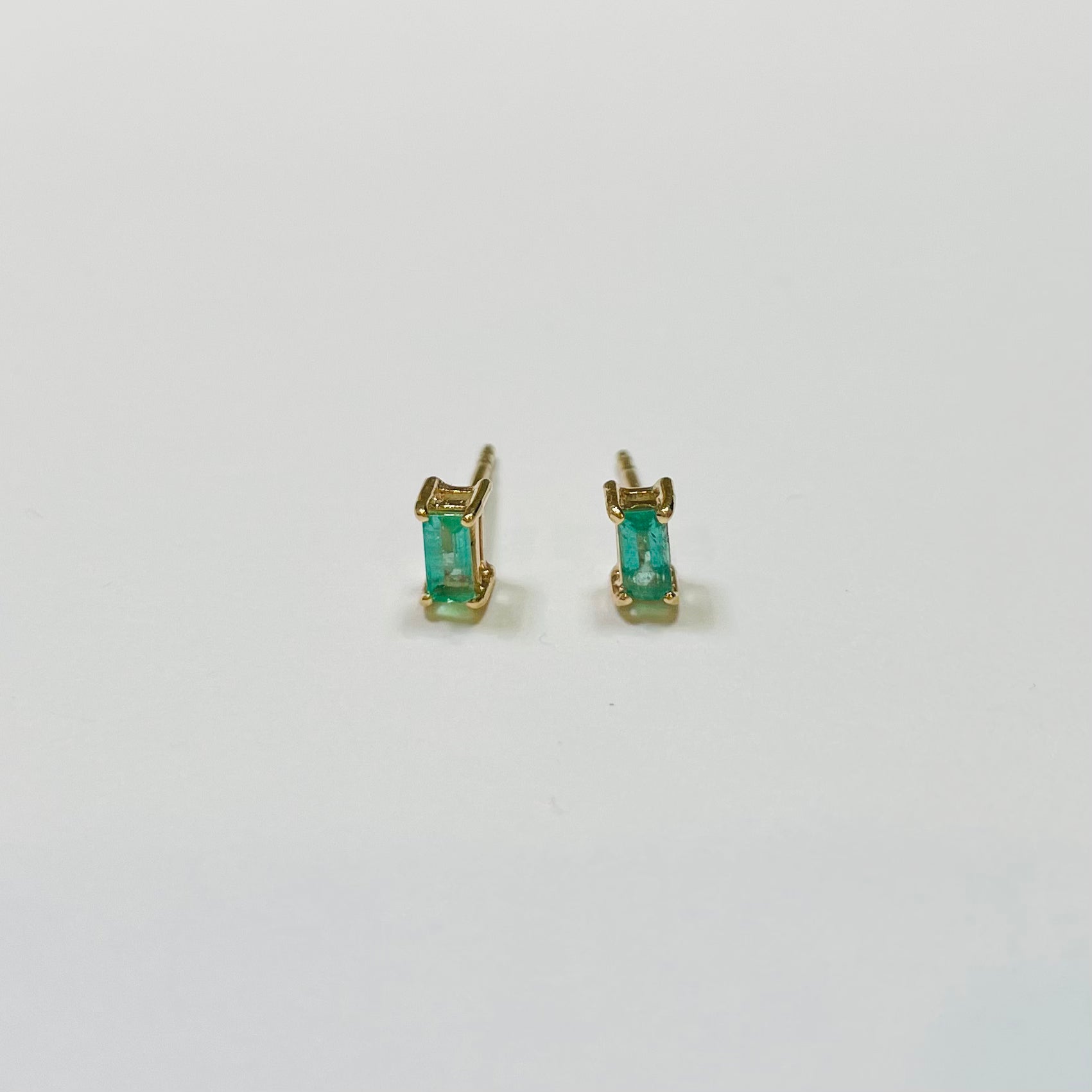 emerald baguette studs