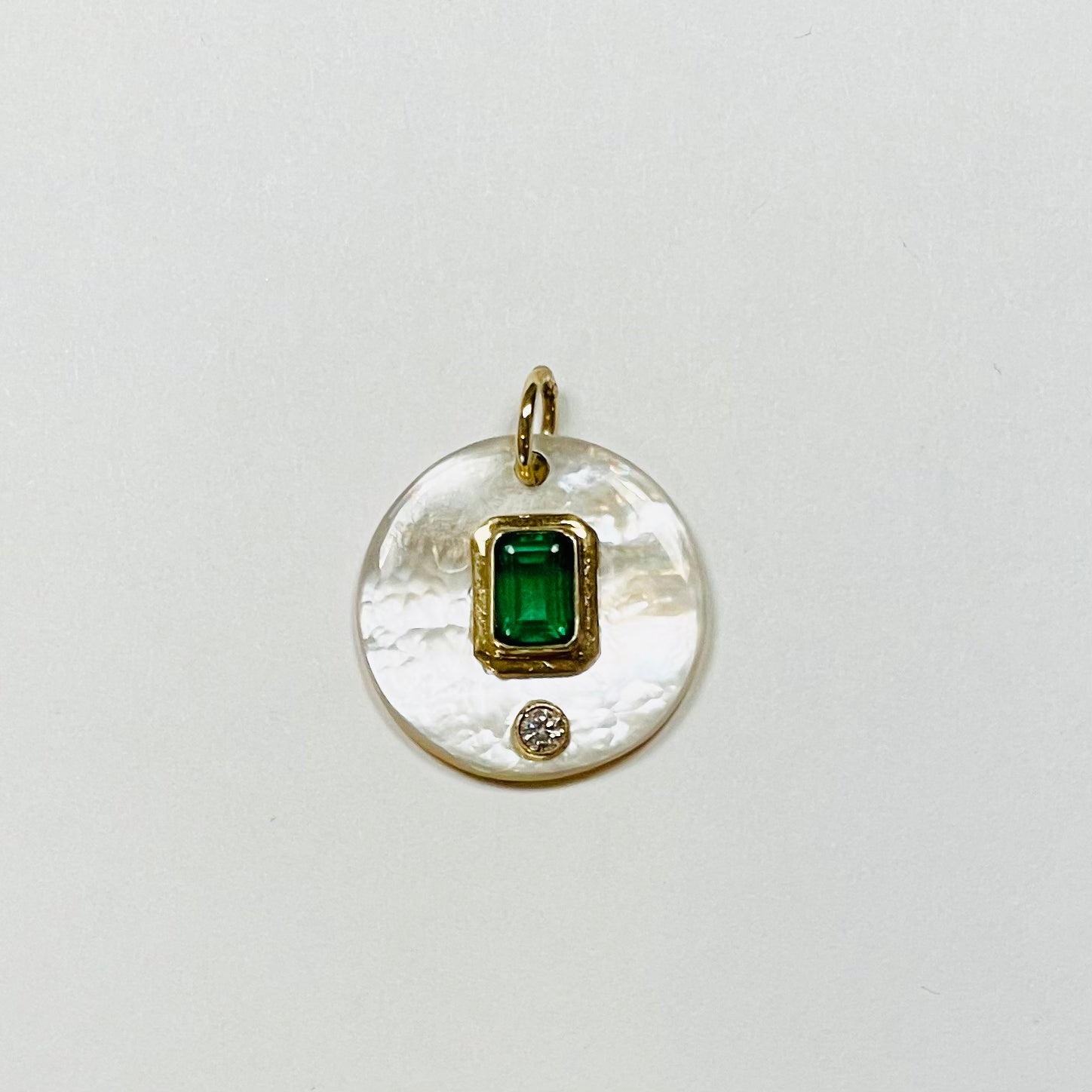 mother of pearl with emerald pendant