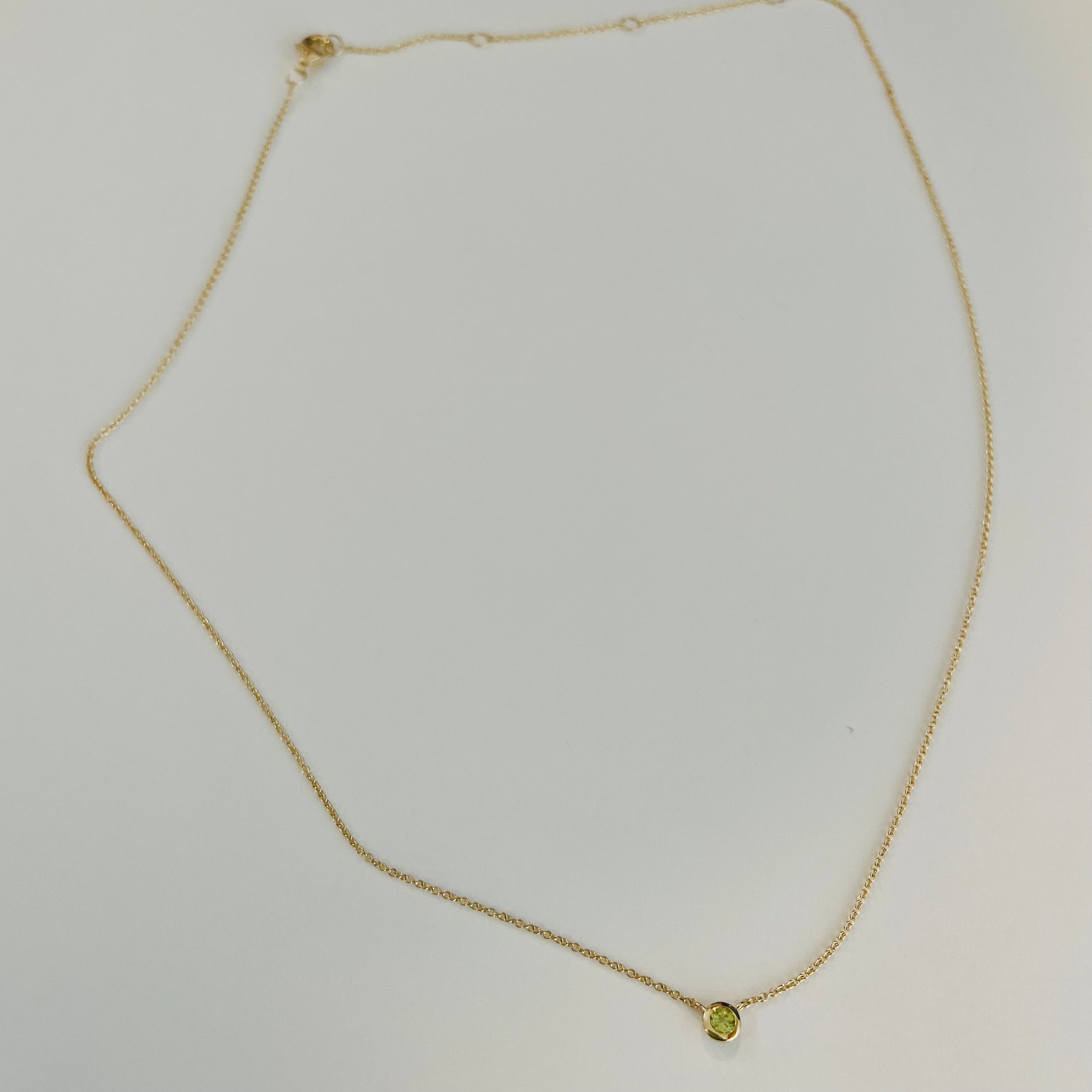 bezel set peridot necklace