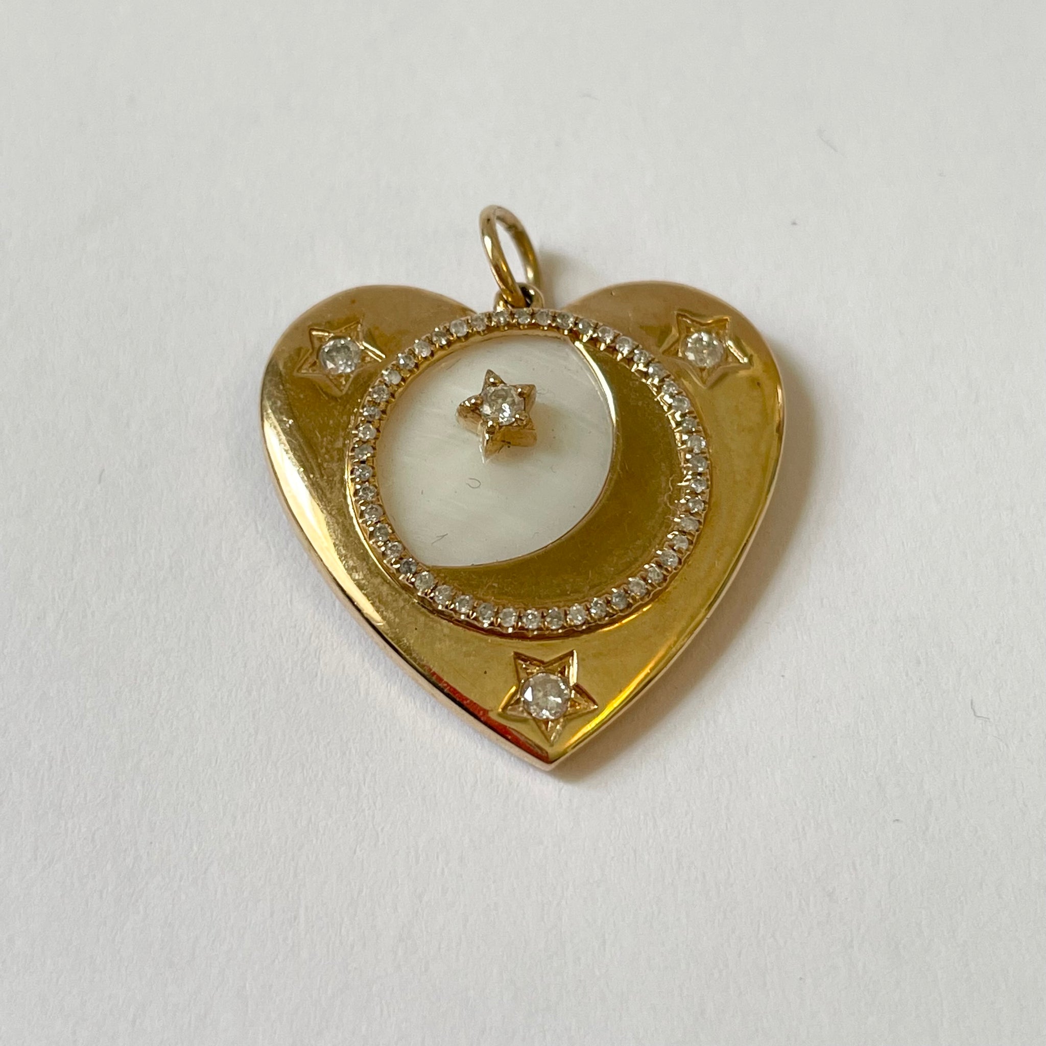 gold and mother of pearl heart pendant