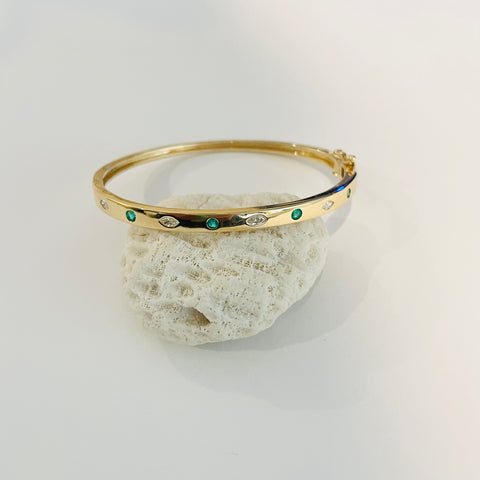 alternating diamond and emerald bangle