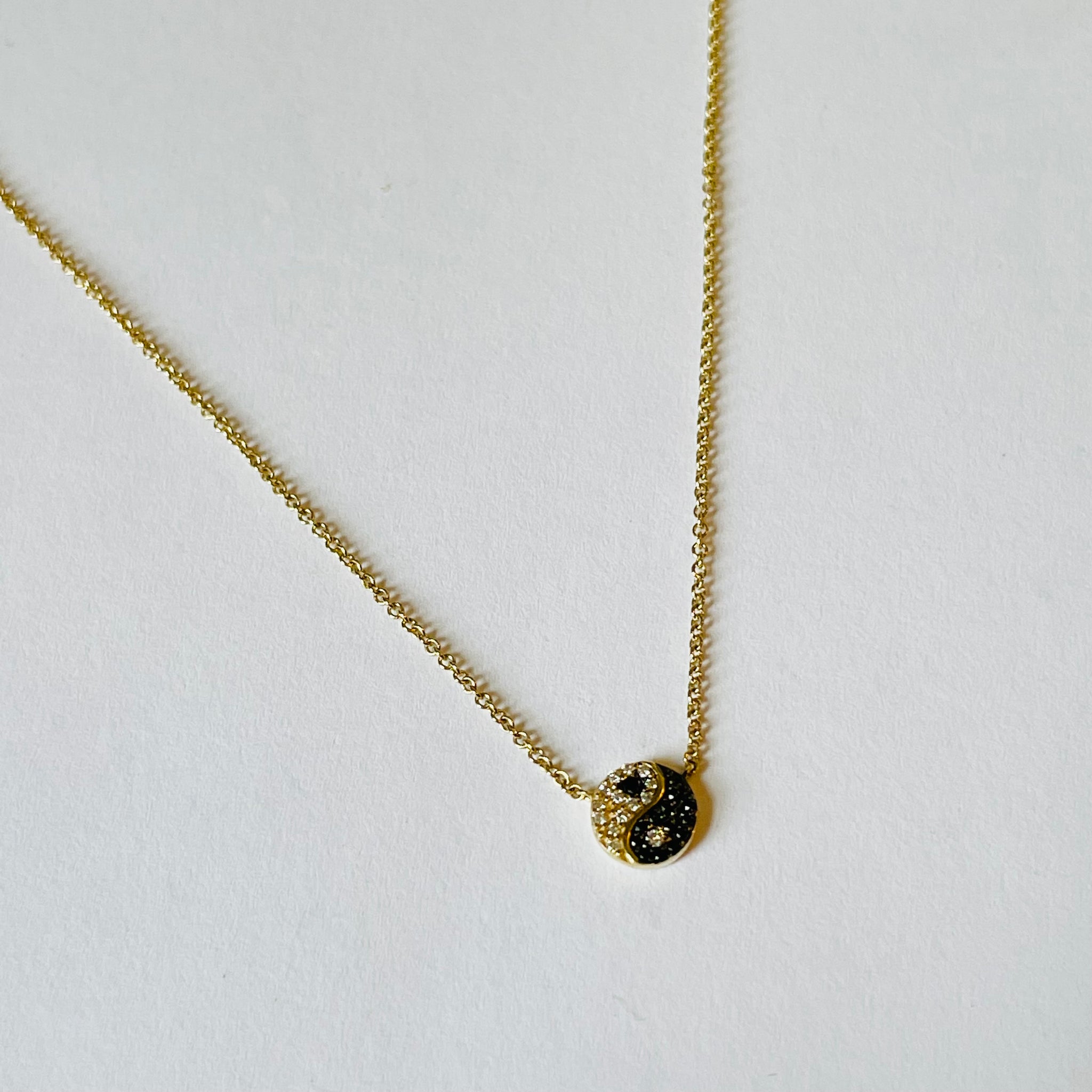 ying yang on gold chain