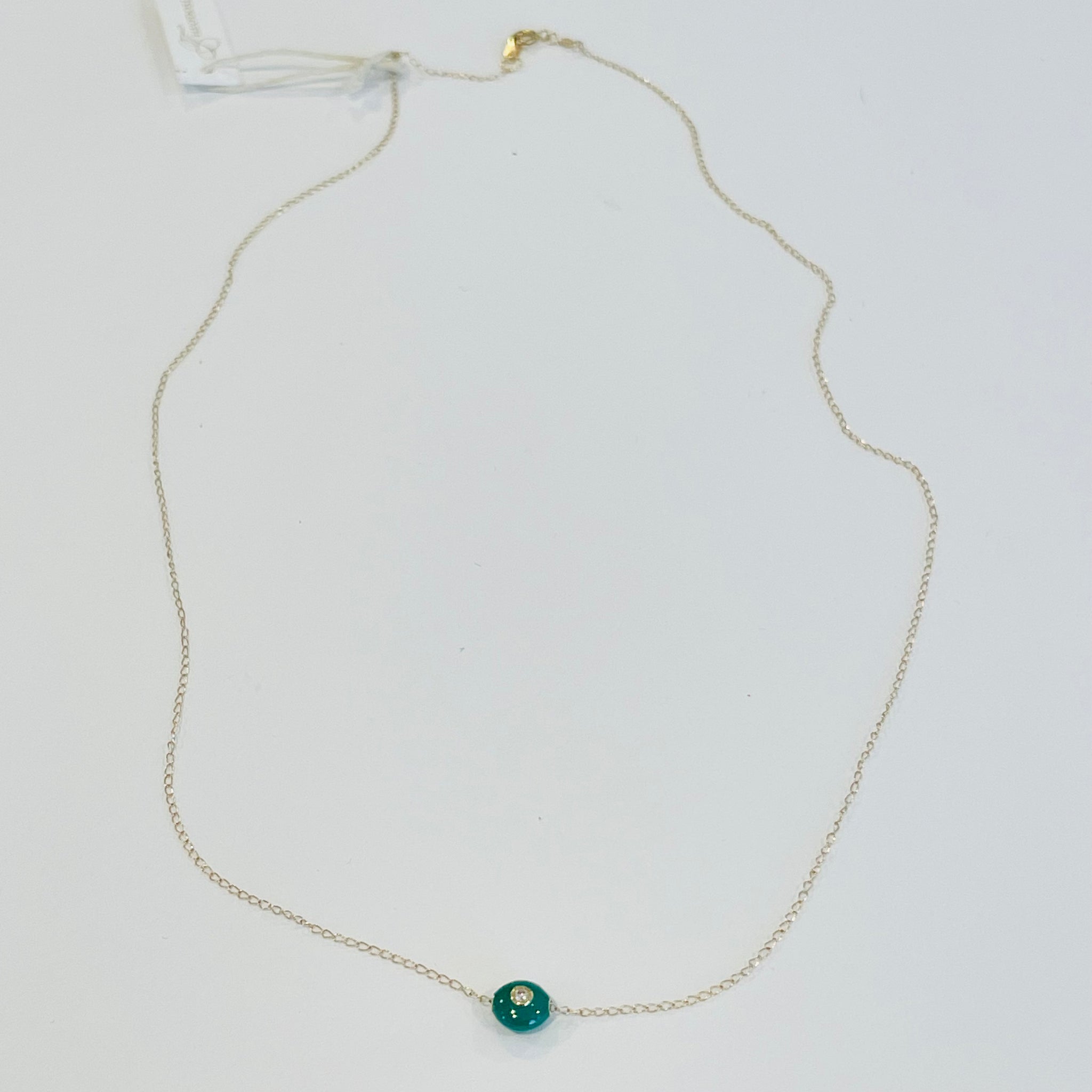 green enamel and diamond bead on gold chain