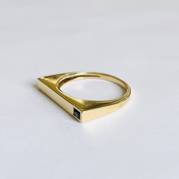 geometric gold ring with sapphire