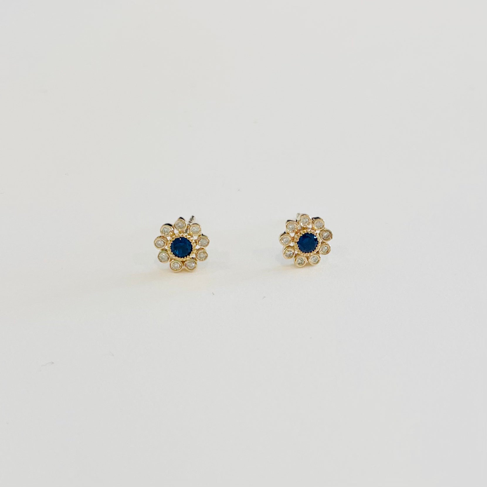 blue sapphire and diamond flower studs