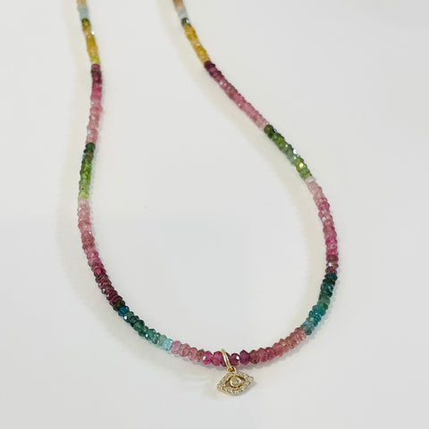 delicate shaded tourmaline necklace with diamond evil eye charm
