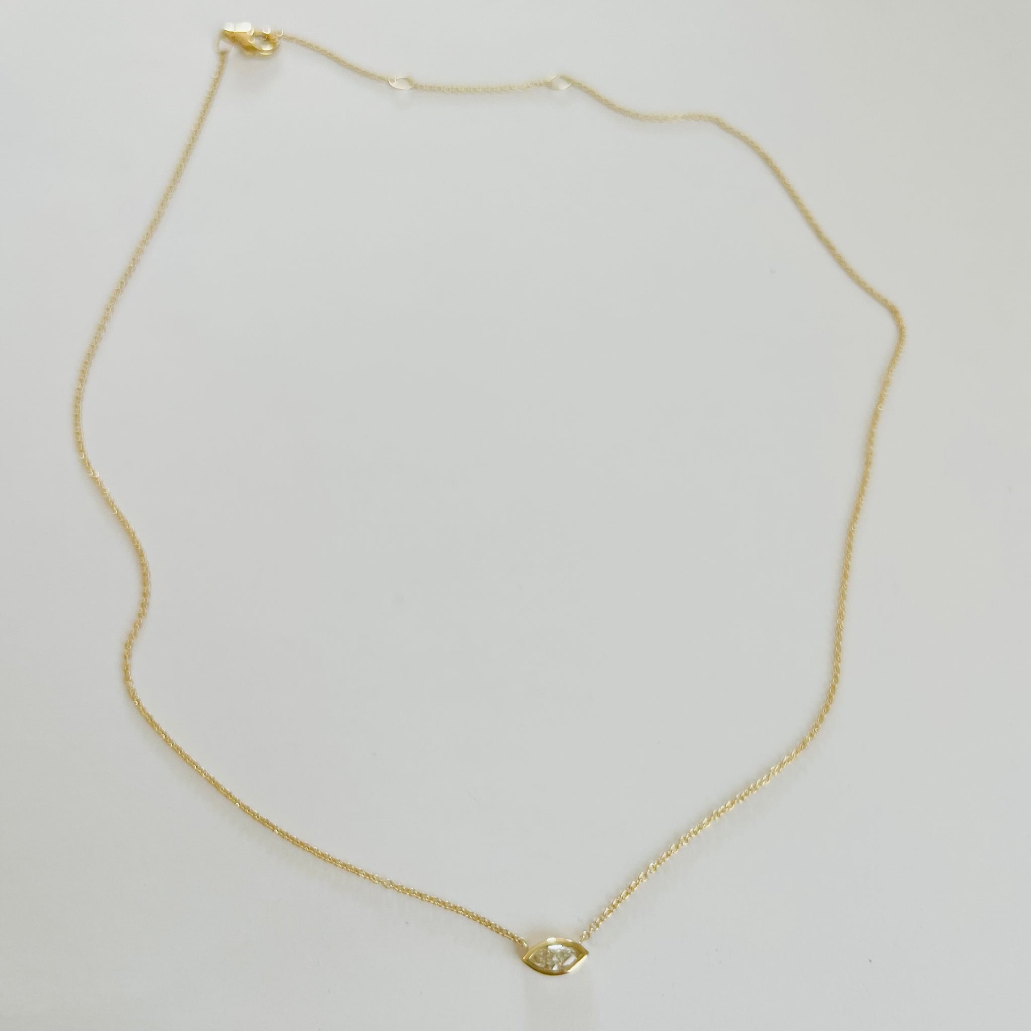 marquee diamond on gold chain