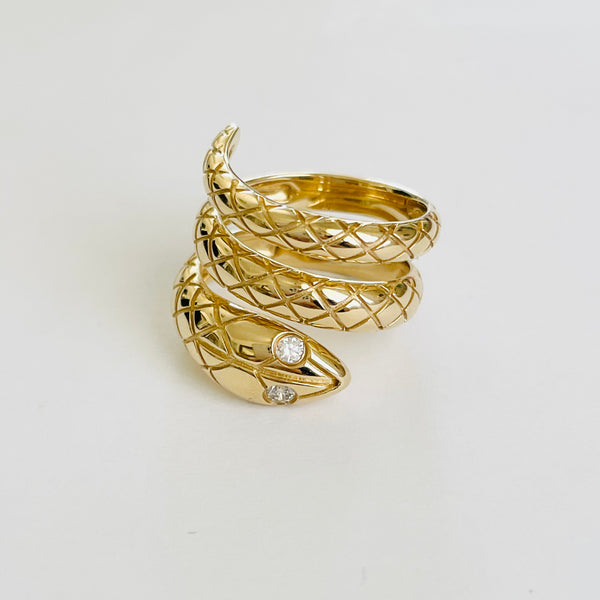 gold snake statement ring with diamonds